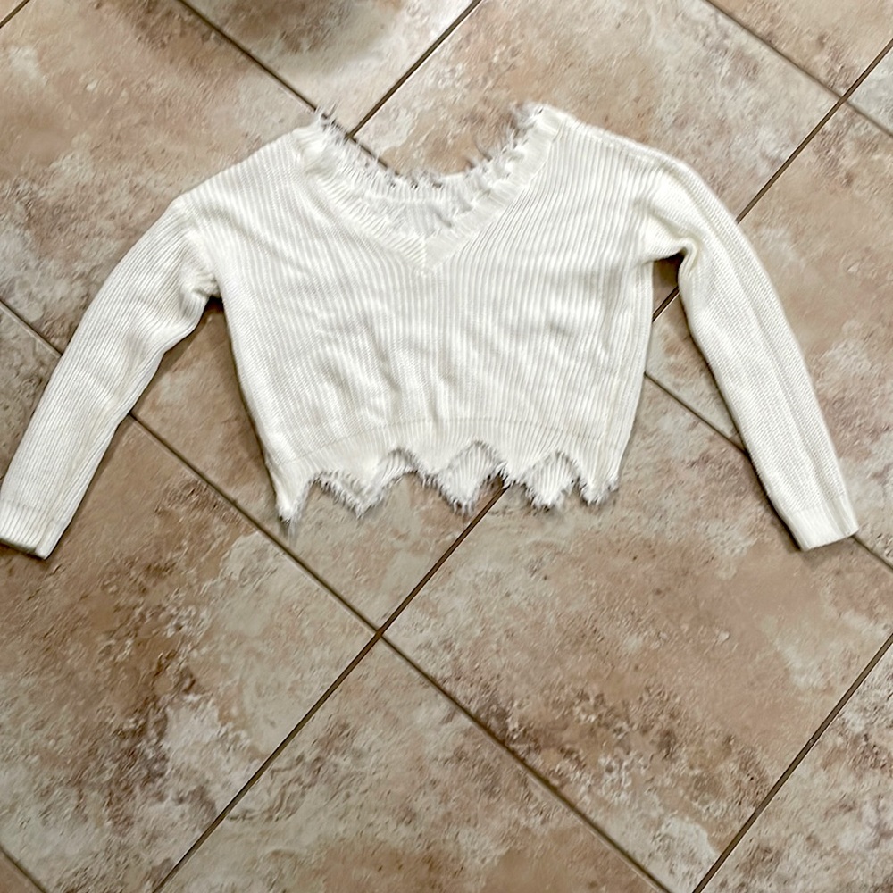 White sweater with white whisps